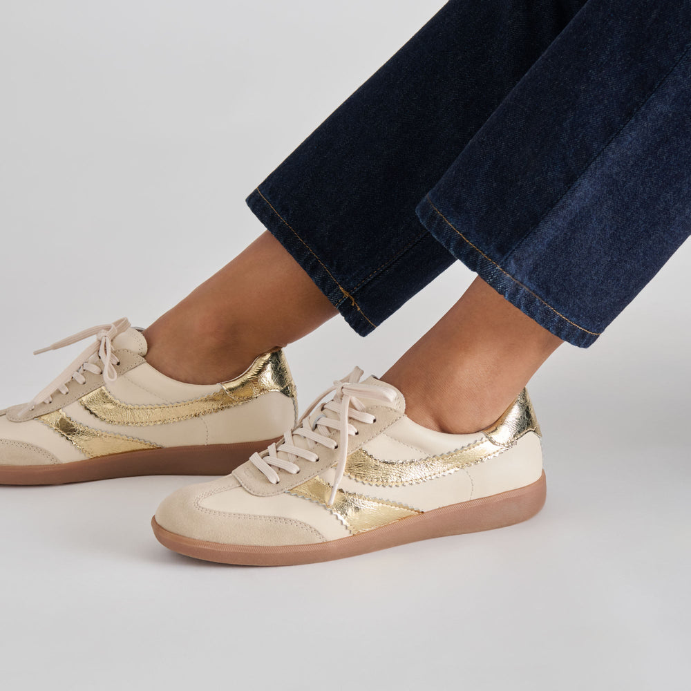 Merit White Gold Leather Sneakers / Dolce Vita